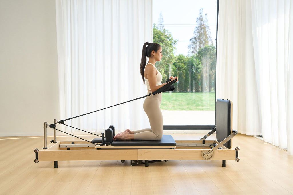SpaceSaver™ Folding Maple Pilates Reformer
