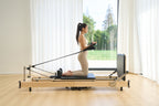 SpaceSaver™ Folding Maple Pilates Reformer