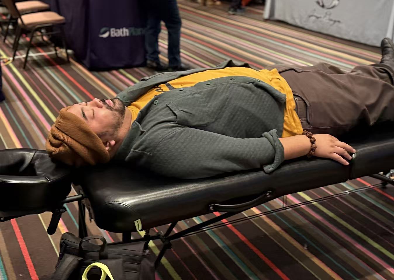 Participant experiencing full-body vibroacoustic relaxation therapy