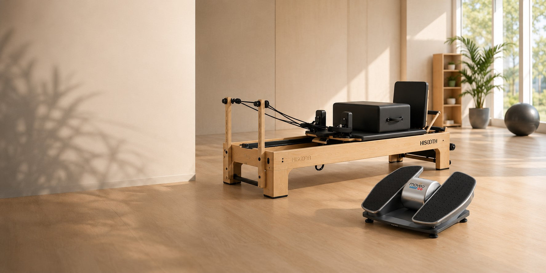 Hisooth Brand Professional Pilates reformer, rehabilitation equipment, and Moveo leg exerciser in a modern wellness studio