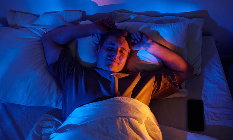 Immersive sleep therapy experience with calming music and synchronized low-frequency body resonance for deeper rest