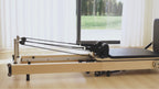 SpaceSaver™ Folding Maple Pilates Reformer
