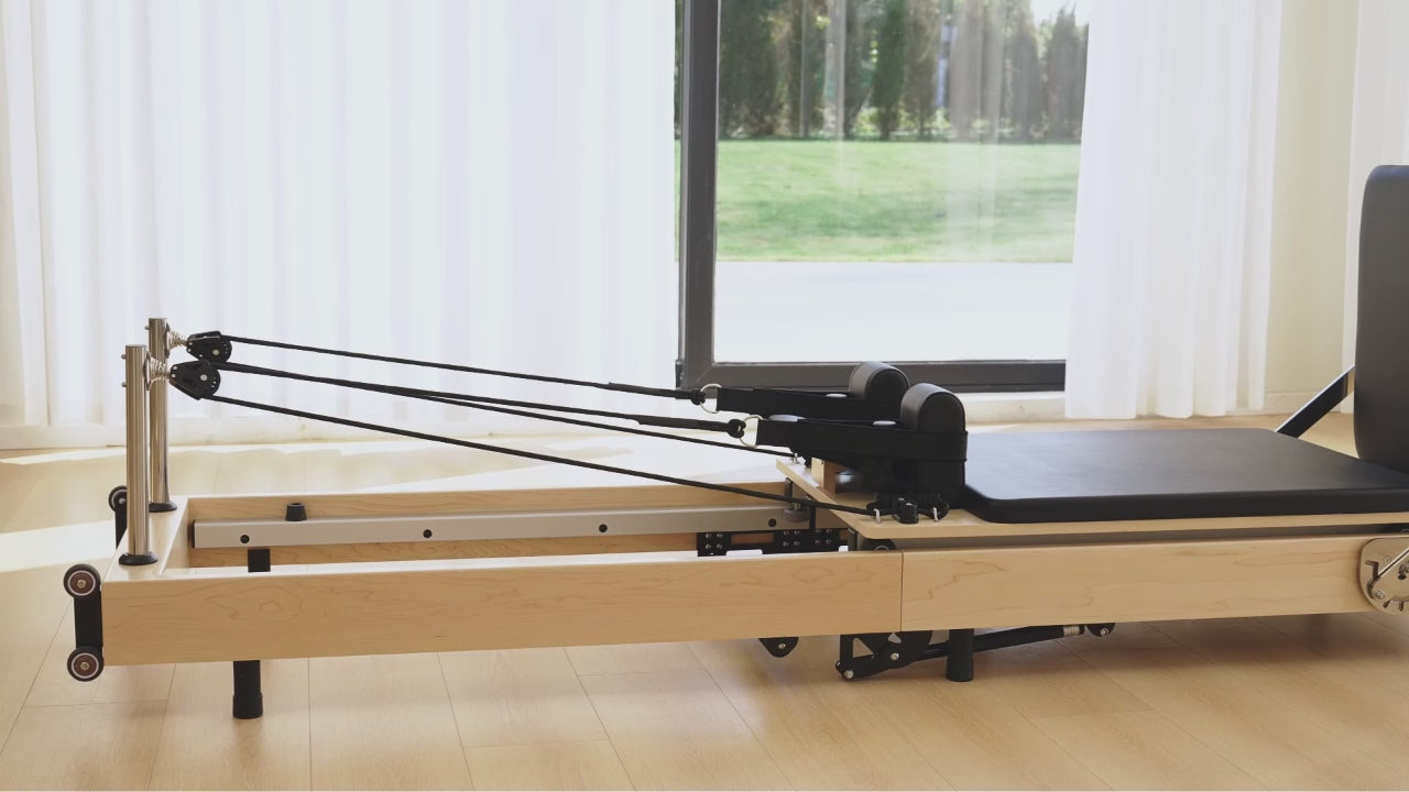 SpaceSaver™ Folding Maple Pilates Reformer